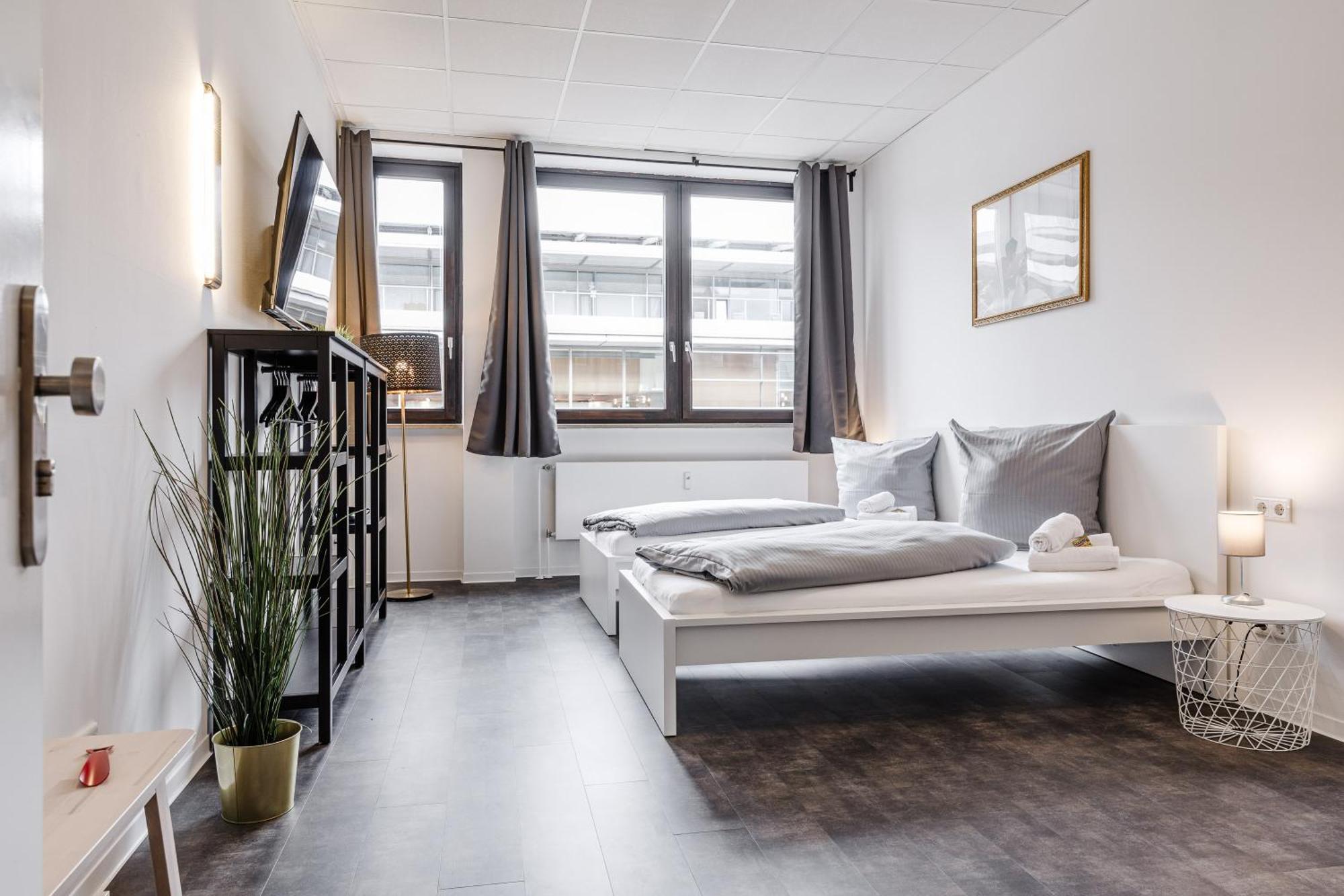 Dreibettzimmer mit Gemeinschaftsbad