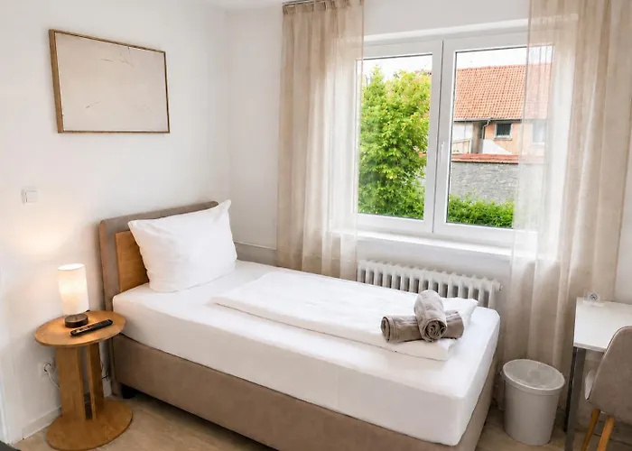 Pension Rent2Stay mit Einzel- oder Doppelzimmer, privatem Bad, Smart-TV, Schnelles WLAN, Parkplatz, Autobahnanschluß